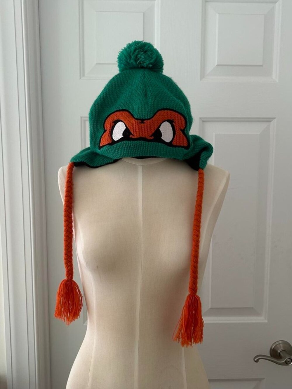 Teenage Mutant Ninja Turtles green & orange beanie with tassels